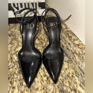JLo Black patent leather, ankle strap stiletto.